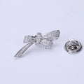 Crystal Bow Brooch In 2 Styles With Polished Metal And Decorative Details view 7