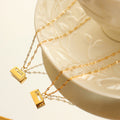 Gold Rectangular Lock Pendant Necklace Twisted Link Chain view 3