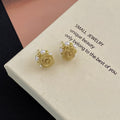 Gold Mesh Flower Pearl Look Border Small Stud Earrings view 3