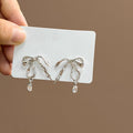 Silver Liquid Metal Bow Stud Earrings Clear Drop Charm view 2