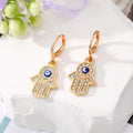 Gold and Silver Tone Pavé Crystal Hamsa Evil Eye Huggie Earrings view 4