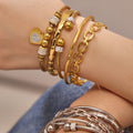 Heart Crystal and Geometric Bangle Collection in Two Metal Tones view 2