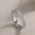 Slim Channel-Set Clear Stone Band In Three Metal Finishes view 2