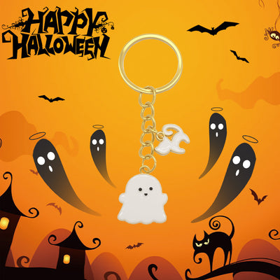 White enamel ghost gold keychain on Happy Halloween orange background