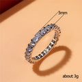 Slim Round Clear Stone Eternity Band In Silver, Gold, And Rose Tones view 4
