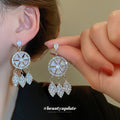 Silver Tone Crystal Wheel Drop Earrings with Teardrops view 1