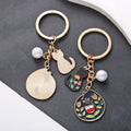 Black Cat Flower and Pearl Enamel Charm Keychain with Round Ring view 2