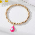 Gold Tone Beaded Teardrop Evil Eye and Hamsa Charm Bracelets view 5