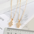 Gold Tone Crystal Boy and Girl Figure Pendant Necklaces view 4