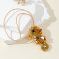 Gold-Tone Beaded Seahorse Pendant Necklace With Pearl Accents view 1