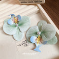 Pale Green And Blue Orchid Hair Clip With Pearl Like Center view 2