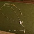 Gold Tone White Pearlescent Butterfly And Heart Lariat Necklace view 3