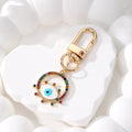 Gold Tone Rhinestone Round Evil Eye Clip Keychains in Six Colors view 3