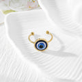 Blue Evil Eye Stud Earrings and Adjustable Rings in Four Finishes view 5