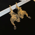 Textured Leaf Drop Earrings In Gold And Silver With Decorative Details view 6