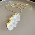 Wavy Translucent Resin Pendant Necklaces in Gold and Silver Tones view 6