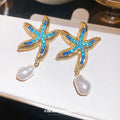 Blue Starfish and White Pearl Drop Earrings with Metal Settings view 1