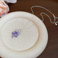 Pastel Flower and Butterfly Pendant Necklaces in Three Colors view 8