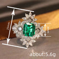 Silver Emerald-Cut Green Center Snowflake Halo Finger Ring view 4