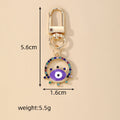 Gold Tone Rhinestone Round Evil Eye Clip Keychains in Six Colors view 4