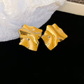 Sculpted Wavy Metal Statement Stud Earrings in Two Finishes view 6