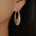 Gold Steel Layered Crescent Hoop Earrings Large And Small view 6
