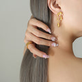 Asymmetric Liquid Drop Stud Earrings Gold And Steel Pair view 4