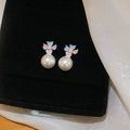 Butterfly and Pearl Stud Earrings in Three Pastel Designs view 6