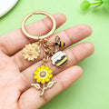 Bee and Honeycomb Charm Keychains in 33 Pictured Variations for Bags and Keys view 1