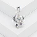 Crystal Treble Clef Brooch With Faceted Crystals And Polished Metal Details view 3