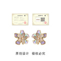 Gold Tone Iridescent Lavender Flower Clear Stone Stud Earrings view 3