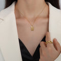 Rectangular Sunburst Pendant Necklace Gold Steel Rose Gold Tags view 3