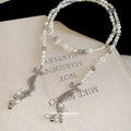 Long Pearl Strand And Crystal Bow Silver Tassel Necklace view 2