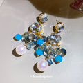 Blue Crystal Floral Drop Earrings in Polished Statement Design view 4