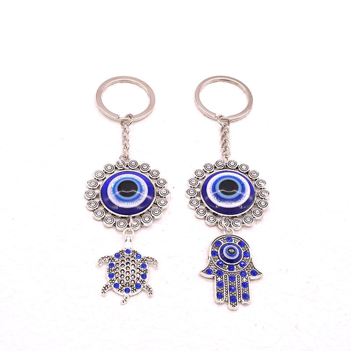 Silver Tone Turtle and Hamsa Blue Evil Eye Split Ring Keychains