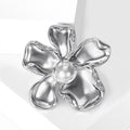Sculpted Flower Brooch in Metal with Smooth Curled Metal Petals Around a White Pearl view 2