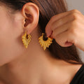 Textured Leaf Cluster Hoop Earrings In Gold Or Steel view 1