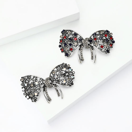 Red multicolor bow brooch close-up product view