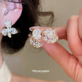 Gold And Silver Floral Stud Earrings In Three Sculpted Designs view 2