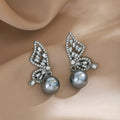 Six Mismatched Wing Butterfly Pearl Look Stud Earrings view 9
