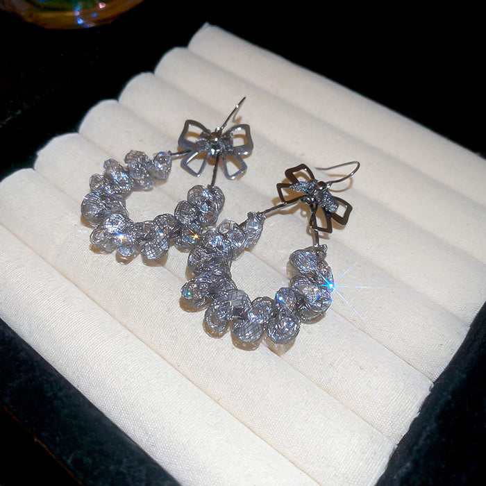 Gray Crystal Openwork Bow Hoop Drop Earrings in Dark Metal