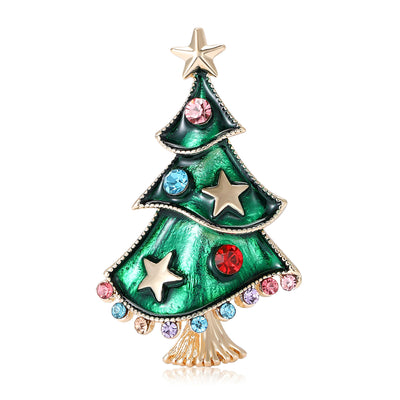 Product display showing a green tiered tree with gold stars, crystals, and a tiny tassel
