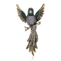 Long-Tailed Bird Brooch In Metal With Spread Wings, A Crystal Body, And A Long Feathered view 1
