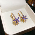 Purple Crystal Flower Huggie Earrings With Decorative Metal Details view 6