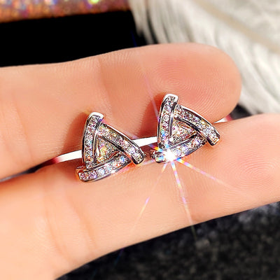 Layered triangle stud earrings in front product view