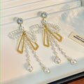 Oversized Pearl Look Bow Long Chain Tassel Earrings view 3