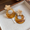 Resin Ring Flower Stud Earrings in Polished Statement Design view 7