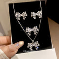 Silver CZ Pearl Bow Necklace Earrings Ring Three Styles view 1