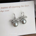 Silver Pavé Zircon Bow Gray Pearl Hook Drop Earrings view 1