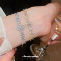 Crystal Leaf Adjustable Bracelet In Gold And Silver view 1